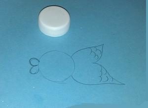 disegnare la forma di un pesce sulla carta